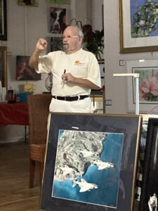 Gateway Art Gallery artist, Benny Ragland, talks about the art of stippling at the Feb. ALNF Luncheon (photo by Sheila Carr)